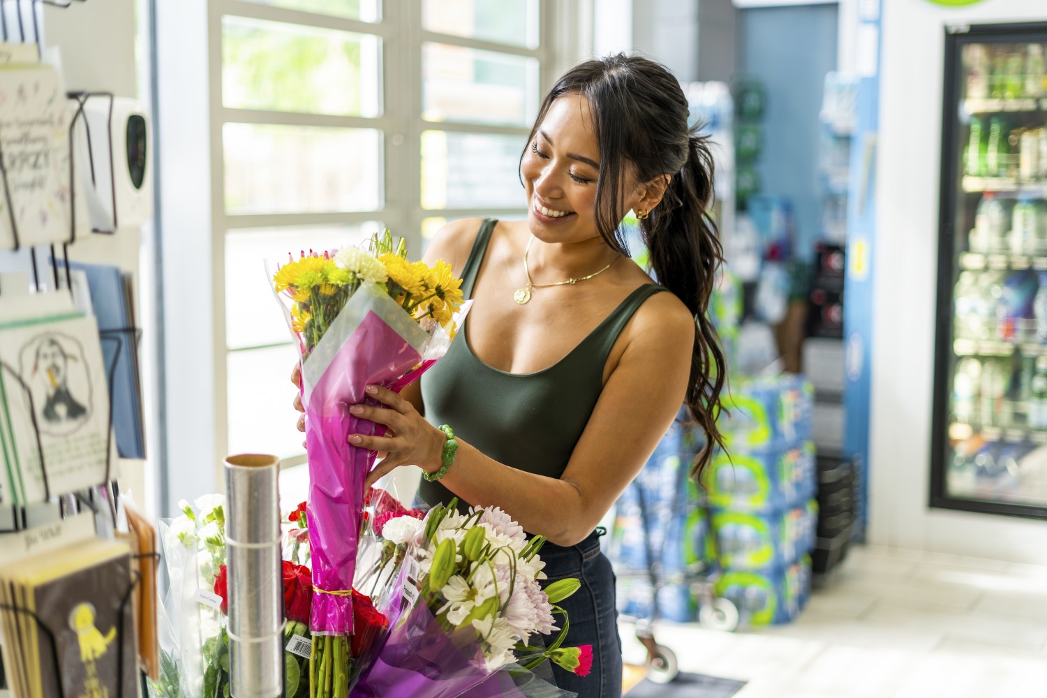 woman shopping for flowers in north bend